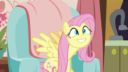 Size: 1280x720 | Tagged: safe, screencap, fluttershy, pegasus, pony, discordant harmony, g4, couch, cute, female, grin, mare, shyabetes, sitting, smiling, solo, spread wings, want, wings