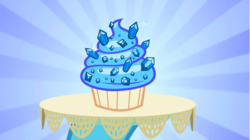 Size: 1282x720 | Tagged: safe, screencap, g4, secret of my excess, cupcake, food, gem, no pony, sapphire, sapphire cupcake, sunburst background, table, tablecloth