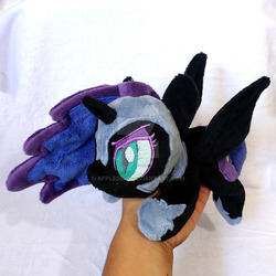 Size: 1024x1024 | Tagged: safe, artist:appledew, nightmare moon, alicorn, pony, g4, beanie (plushie), female, hand, irl, jewelry, mare, photo, plushie, prone, regalia, solo, spread wings, watermark, wings