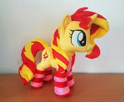 Size: 480x398 | Tagged: safe, artist:epicrainbowcrafts, sunset shimmer, pony, unicorn, g4, clothes, cute, irl, photo, plushie, scarf, smiling, socks, solo, standing, striped socks
