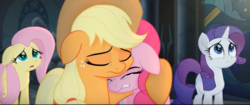 Size: 852x359 | Tagged: safe, screencap, applejack, fluttershy, pinkie pie, rarity, earth pony, pegasus, pony, unicorn, g4, my little pony: the movie, canterlot castle, comforting, crying, crying on the outside, eyes closed, female, floppy ears, hug, looking up, mare, sad