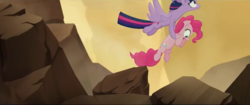 Size: 853x358 | Tagged: safe, screencap, pinkie pie, twilight sparkle, alicorn, earth pony, pony, g4, my little pony: the movie, carrying, female, flying, looking down, looking up, rescue, rock, saved, scared, twilight sparkle (alicorn)