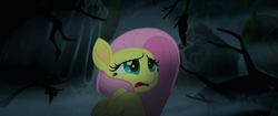 Size: 1920x804 | Tagged: safe, screencap, fluttershy, pegasus, pony, g4, my little pony: the movie, female, mare, scared, solo