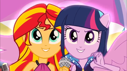 Size: 1366x768 | Tagged: safe, screencap, sunset shimmer, twilight sparkle, equestria girls, g4, my little pony equestria girls: rainbow rocks, >:d, happy, ponied up, smiling, smirk, welcome to the show