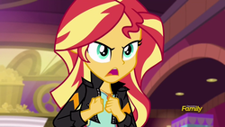 Size: 1920x1080 | Tagged: safe, screencap, sunset shimmer, equestria girls, equestria girls specials, g4, my little pony equestria girls: mirror magic, cinema, clothes, discovery family logo, female, geode of empathy, jacket, leather jacket, offscreen character, open mouth, solo, talking, theater