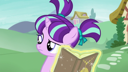 Size: 1280x720 | Tagged: safe, screencap, starlight glimmer, pony, unicorn, the crystalling, book, female, filly, filly starlight glimmer, pigtails, ribbon, solo, younger