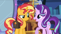 Size: 1136x640 | Tagged: safe, screencap, starlight glimmer, sunset shimmer, equestria girls, equestria girls specials, g4, mirror magic, discovery family logo