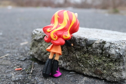 Size: 6000x4000 | Tagged: safe, artist:artofmagicpoland, sunset shimmer, equestria girls, g4, absurd resolution, clothes, doll, equestria girls minis, eqventures of the minis, irl, photo, pushing, rock, skirt, strong, stronk, toy