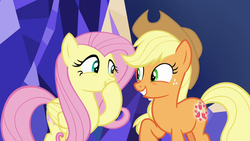 Size: 1280x720 | Tagged: safe, screencap, applejack, fluttershy, earth pony, pegasus, pony, g4, my little pony: friendship is magic, sounds of silence, cute, female, happy, jackabetes, looking at each other, mare, raised hoof, shyabetes, smiling