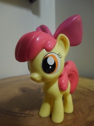 Size: 4160x3120 | Tagged: safe, photographer:apex soundwave, apple bloom, earth pony, pony, g4, bow, collectible, female, filly, funko, irl, mare, photo, small, solo, toy, vinyl collectible, vinyl figure