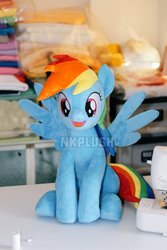 Size: 682x1024 | Tagged: safe, artist:nekokevin, rainbow dash, pegasus, pony, g4, cute, female, irl, looking at you, mare, open mouth, photo, plushie, raised hoof, sewing machine, sitting, smiling, solo, spread wings, table, underhoof, watermark, wings
