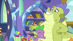 Size: 1280x720 | Tagged: safe, screencap, sludge (g4), spike, dragon, father knows beast, g4, bookshelf, duo, eyes closed, gem, hug, male, winged spike, wings