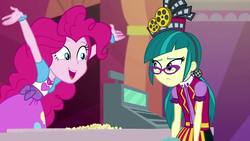 Size: 1920x1080 | Tagged: safe, screencap, juniper montage, pinkie pie, equestria girls, equestria girls specials, g4, mirror magic, apron, arms in the air, bauble, belt, bracelet, cardigan, cash register, cinema, clothes, excited, female, food, geode of sugar bombs, glasses, hair tie, hat, jewelry, mirror, open mouth, pigtails, poofy shoulders, popcorn, shirt, skirt, standing, teenager, twintails, uniform, vest
