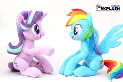 Size: 1200x800 | Tagged: safe, artist:nekokevin, rainbow dash, starlight glimmer, pegasus, pony, unicorn, series:nekokevin's glimmy, g4, cute, dashabetes, duo, female, glimmerbetes, irl, looking at each other, mare, open mouth, photo, plushie, raised hoof, simple background, sitting, smiling, spread wings, underhoof, watermark, white background, wings
