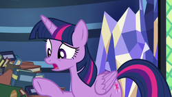 Size: 1280x720 | Tagged: safe, screencap, twilight sparkle, alicorn, pony, father knows beast, g4, book, female, library, solo, twilight sparkle (alicorn), twilight's castle, twilight's castle library