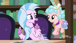 Size: 1920x1080 | Tagged: safe, screencap, cozy glow, silverstream, hippogriff, pegasus, pony, g4, school raze, chair, duo, duo female, female, filly, flying, foal, happy, library, pencil, sitting