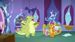 Size: 1280x720 | Tagged: safe, screencap, sludge (g4), smolder, spike, dragon, father knows beast, g4, displeased, dragoness, female, fraud, male, raised eyebrow, shrug, spike's room, trio, winged spike, wings
