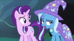 Size: 1136x640 | Tagged: safe, screencap, starlight glimmer, trixie, pony, unicorn, g4, to change a changeling, cape, clothes, duo, female, hat, mare, sigh, smiling, trixie's cape, trixie's hat