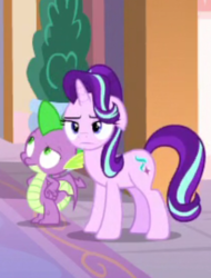 Size: 575x757 | Tagged: safe, screencap, spike, starlight glimmer, dragon, a matter of principals, g4, season 8, cropped, floppy ears, starlight glimmer is not amused, unamused, winged spike, wings