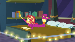 Size: 1920x1080 | Tagged: safe, screencap, sunset shimmer, equestria girls, equestria girls series, forgotten friendship, g4, ass, ass up, bed, book, bunset shimmer, butt, clothes, fairy lights, female, journal, pajamas, reaching, slippers, solo, string lights, sunset's apartment, the pose