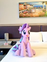 Size: 768x1024 | Tagged: safe, artist:nekokevin, starlight glimmer, pony, unicorn, series:nekokevin's glimmy, g4, bed, cute, female, irl, open mouth, phone, photo, pillow, plushie, sitting, smiling, solo, underhoof