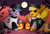 Size: 2516x1689 | Tagged: safe, artist:pridark, oc, oc only, oc:dipsy, oc:iona, clothes, cloven hooves, costume, cute, full moon, glasses, green eyes, halloween, holiday, jack-o-lantern, moon, night, ocbetes, one eye closed, pepper shaker, pumpkin, raised hoof, salt shaker, stars, underhoof, wink