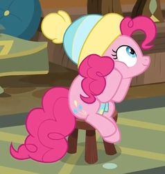 Size: 475x499 | Tagged: safe, screencap, pinkie pie, earth pony, pony, g4, my little pony best gift ever, clothes, cropped, female, hat, mare, scarf, sitting, solo, stool, winter outfit