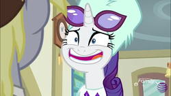 Size: 960x540 | Tagged: safe, screencap, derpy hooves, rarity, pony, unicorn, g4, my little pony best gift ever, awkward smile, clothes, cute, faic, female, glasses, hat, majestic as fuck, mare, raribetes, smiling, winter outfit