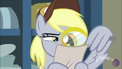 Size: 960x540 | Tagged: safe, screencap, derpy hooves, pony, g4, my little pony best gift ever, female, hat, magnifying glass, mailmare hat, mare, solo, wing hands