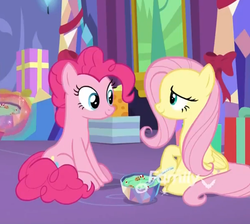 Size: 603x540 | Tagged: safe, screencap, fluttershy, pinkie pie, earth pony, pegasus, pony, g4, my little pony best gift ever, bowl, cropped, discovery family logo, duo, female, food, mare, pudding, puddinghead's pudding, sitting, smiling