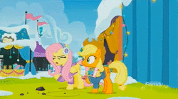 Size: 1152x640 | Tagged: safe, screencap, applejack, fluttershy, holly the hearths warmer doll, g4, my little pony best gift ever, angry, animated, clothes, cute, ear warmers, female, i could just kick something, peeved, rock, shyabetes, sound, sweater, webm, winter outfit