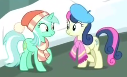 Size: 420x253 | Tagged: safe, screencap, bon bon, lyra heartstrings, sweetie drops, earth pony, pony, unicorn, g4, my little pony best gift ever, beret, clothes, cropped, duo, female, hat, mare, scarf, snow, striped scarf, winter outfit