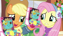 Size: 1920x1080 | Tagged: safe, screencap, applejack, fluttershy, holly the hearths warmer doll, earth pony, pegasus, pony, g4, my little pony best gift ever, animated, box, clothes, cute, denied, discovery family logo, ear warmers, female, imitation, jackabetes, jacket, mare, rejected, sound, sweater, toy, webm, winter outfit, yay