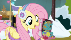 Size: 1920x1080 | Tagged: safe, screencap, fluttershy, holly the hearths warmer doll, pony, g4, my little pony best gift ever, animated, clothes, female, i love being an expensive toy, meme origin, pullstring, solo, sound, toy, webm, winter outfit