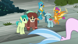 Size: 1280x720 | Tagged: safe, screencap, gallus, ocellus, sandbar, silverstream, smolder, yona, changedling, changeling, dragon, earth pony, griffon, pony, seapony (g4), yak, g4, school daze, bow, cloven hooves, colored hooves, crossed arms, dragoness, female, flying, hair bow, male, monkey swings, paws, seapony silverstream, student six, tail, teenager, wings