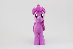 Size: 3000x2000 | Tagged: safe, artist:nekokevin, berry punch, berryshine, earth pony, pony, g4, female, high res, irl, looking at you, mare, photo, plushie, simple background, smiling, solo, white background