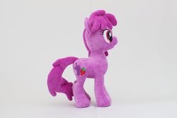 Size: 3000x2000 | Tagged: safe, artist:nekokevin, berry punch, berryshine, earth pony, pony, g4, female, high res, irl, mare, photo, plushie, side view, simple background, smiling, solo, white background