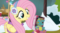 Size: 1920x1080 | Tagged: safe, edit, edited screencap, screencap, sound edit, fluttershy, holly the hearths warmer doll, twilight sparkle, pony, best gift ever, g4, animated, clothes, faic, female, i love being an expensive toy, meme, meme template, pudding face, solo, sound, toy, webm, winter outfit
