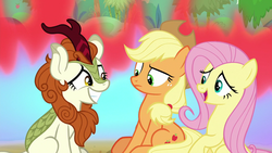 Size: 1280x720 | Tagged: safe, screencap, applejack, autumn blaze, fluttershy, earth pony, kirin, pegasus, pony, g4, season 8, sounds of silence, awwtumn blaze, cute, female, fire, grin, looking at each other, mare, nervous, nervous smile, open mouth, shyabetes, sitting, smiling, trio