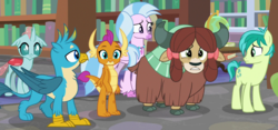 Size: 1211x566 | Tagged: safe, screencap, gallus, ocellus, sandbar, silverstream, smolder, yona, changedling, changeling, classical hippogriff, dragon, earth pony, griffon, hippogriff, pony, yak, g4, what lies beneath, bow, cloven hooves, colored hooves, dragoness, female, hair bow, implied cozy glow, insult, jewelry, male, monkey swings, necklace, paws, student six, teenager