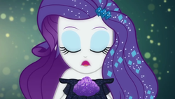 Size: 1280x720 | Tagged: safe, screencap, rarity, equestria girls, g4, my little pony equestria girls: better together, the other side, bare shoulders, blowing, female, glitter, solo