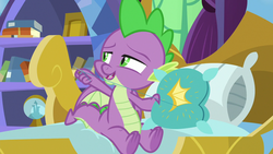 Size: 1280x720 | Tagged: safe, screencap, spike, dragon, father knows beast, g4, male, pillow, solo, throw pillow, winged spike, wings