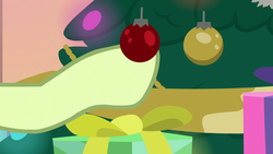Size: 1280x720 | Tagged: safe, screencap, sandbar, earth pony, pony, g4, the hearth's warming club, christmas, christmas tree, disembodied hoof, hearth's warming tree, holiday, male, offscreen character, ornament, present, solo, teenager, tree