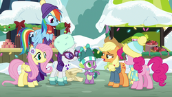 Size: 1280x720 | Tagged: safe, screencap, applejack, fluttershy, pinkie pie, rainbow dash, rarity, spike, dragon, earth pony, pegasus, pony, unicorn, g4, my little pony best gift ever, clothes, earmuffs, female, fluttershy's purple sweater, glasses, hat, male, mare, scarf, snow, striped scarf, sweater, sweatershy, twilight sparkle (alicorn), winged spike, wings, winter outfit