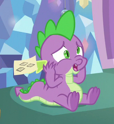 Size: 327x354 | Tagged: safe, screencap, spike, dragon, best gift ever, g4, cropped, derp, male, paper, sitting, solo, winged spike, wings