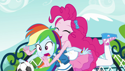 Size: 1920x1080 | Tagged: safe, screencap, pinkie pie, rainbow dash, equestria girls, equestria girls specials, g4, my little pony equestria girls: better together, my little pony equestria girls: forgotten friendship, clothes, cute, eyes closed, female, football, glomp, hairclip, happy, hug, open mouth, out of context, photo, sandals, shirt, smiling, sports, surprised, wristband