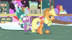 Size: 1280x720 | Tagged: safe, screencap, applejack, spike, dragon, earth pony, pony, g4, my little pony best gift ever, clothes, scarf, smug, snow, striped scarf, winged spike, wings, winter outfit
