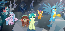 Size: 1849x906 | Tagged: safe, screencap, gallus, ocellus, sandbar, silverstream, smolder, yona, changedling, changeling, classical hippogriff, dragon, earth pony, griffon, hippogriff, pony, yak, g4, what lies beneath, bow, cloven hooves, crystal, dragoness, female, flying, hair bow, looking up, male, nightmare cave, student six, teenager