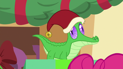 Size: 1280x720 | Tagged: safe, screencap, gummy, alligator, g4, my little pony best gift ever, christmas, hat, holiday, male, santa hat, solo