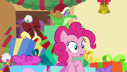 Size: 1280x720 | Tagged: safe, screencap, gummy, pinkie pie, g4, my little pony best gift ever, christmas, hat, holiday, present, santa hat
